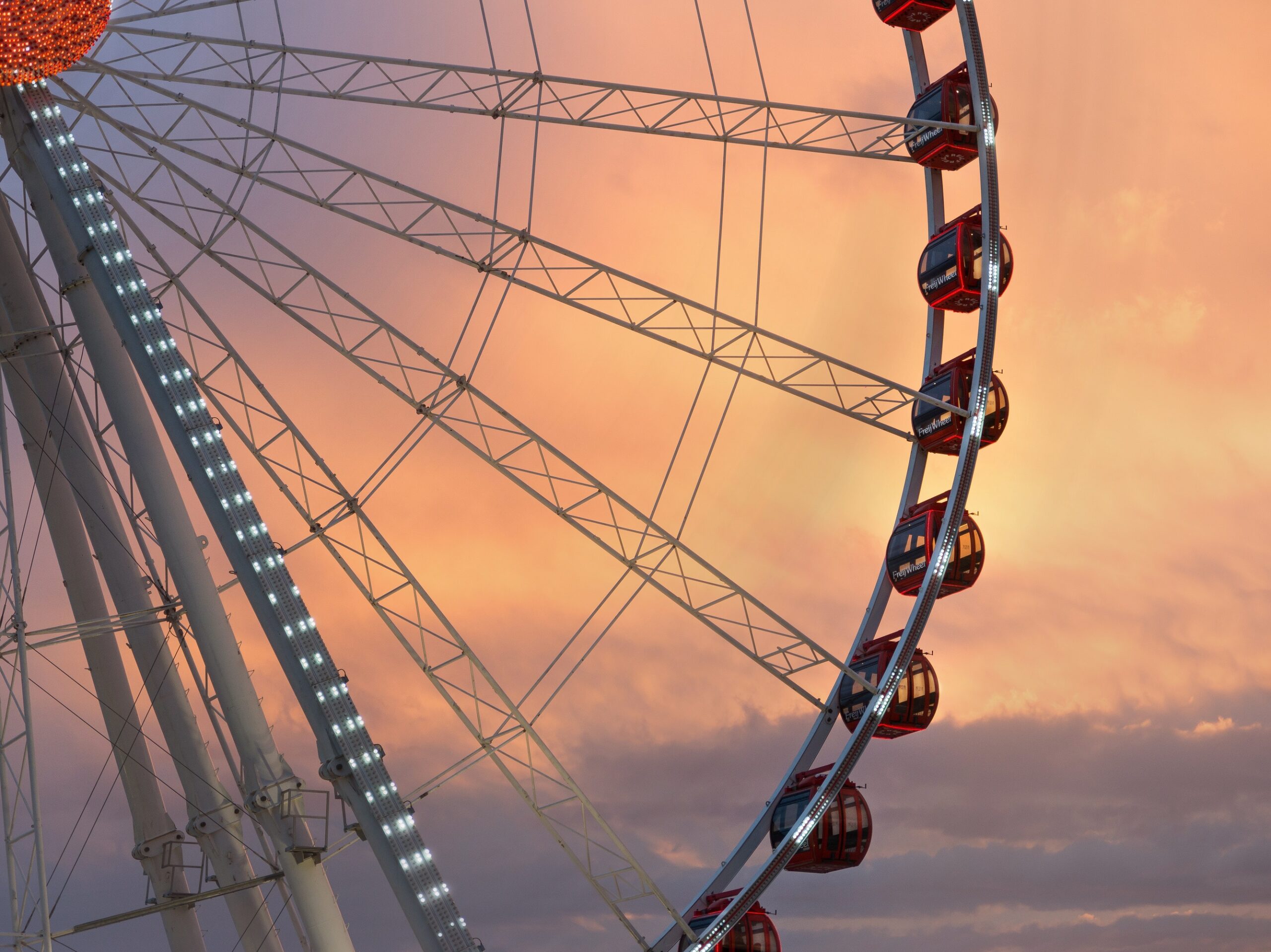 Ferris Wheel on a dusky cloudy sky